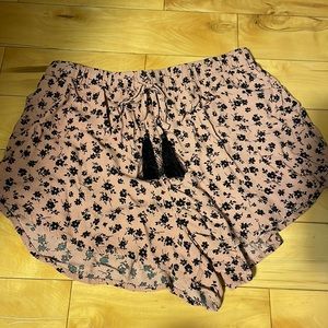 Pink shorts with black flowers